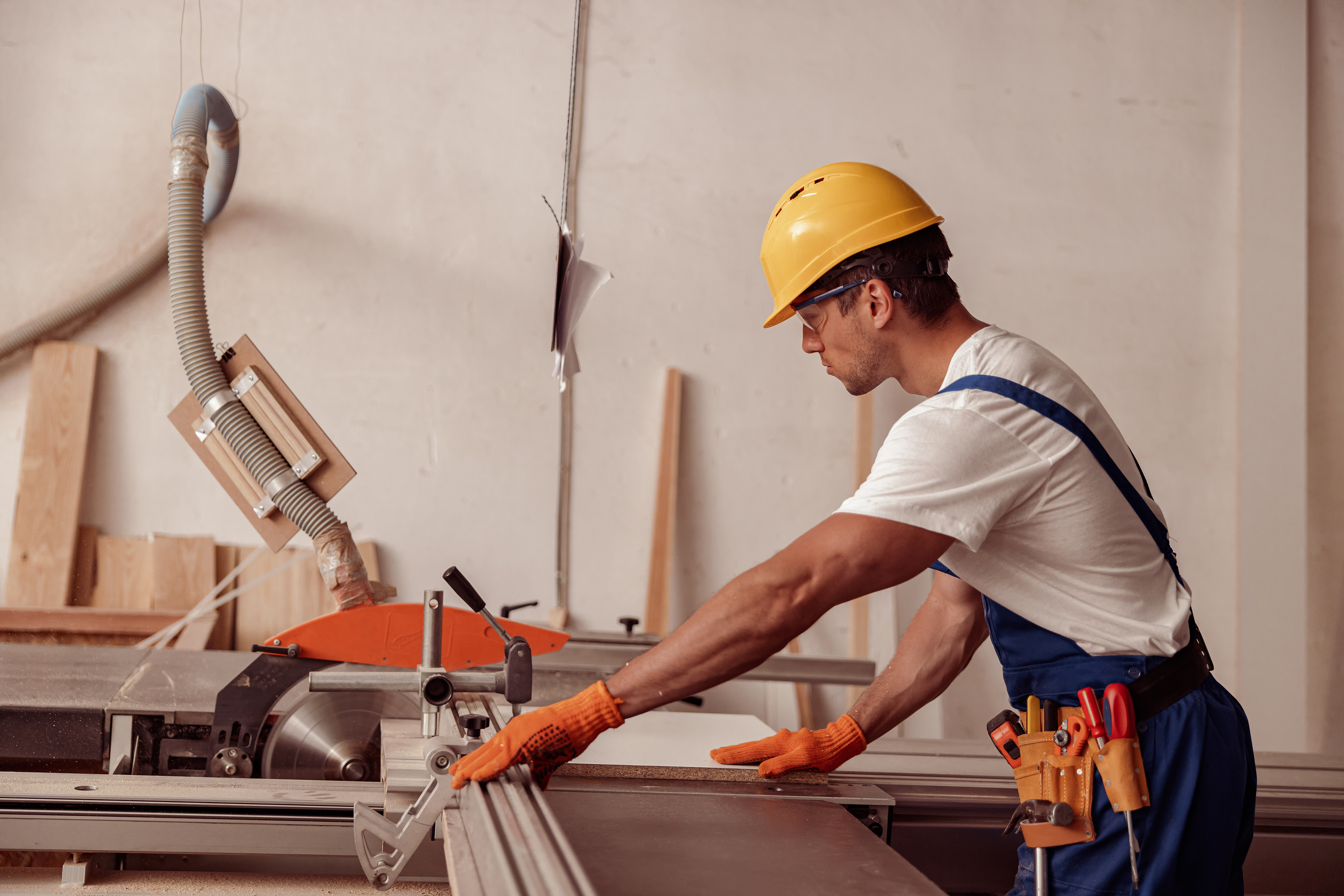 male builder using woodworking machine in workshop 2022 01 04 23 26 19 utc 1